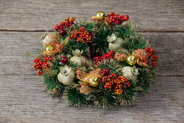 Christmas wreath on a plank - Download Free Stock Photos Pikwizard.com
