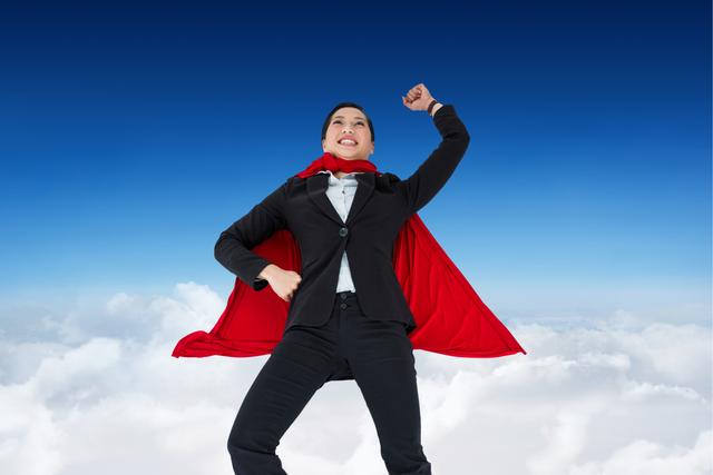 Businesswoman wearing  super hero cape in sky - Download Free Stock Photos Pikwizard.com