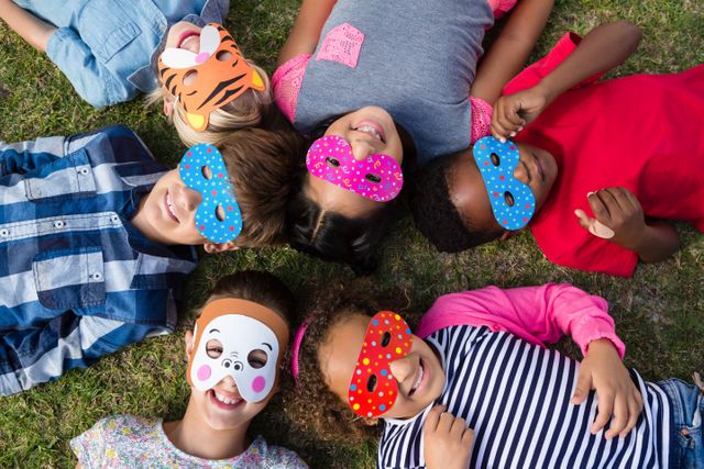 Directly above shot of children wearing masks - Download Free Stock Photos Pikwizard.com