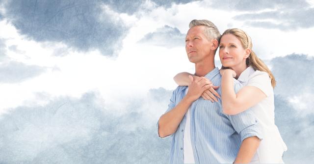Digital composite of Digital composite image of couple looking away in sky