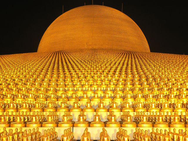 a building with many golden statues - Download Free Stock Photos Pikwizard.com