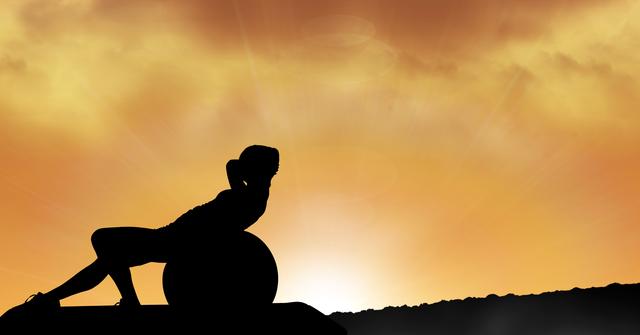 Silhouette person exercising on ball against sky during sunset - Download Free Stock Photos Pikwizard.com