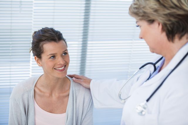 Doctor interacting with patient - Download Free Stock Photos Pikwizard.com