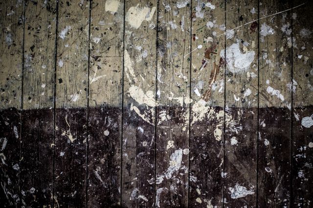 Close up view of white paint stains on wooden textured background. background with abstract texture concept