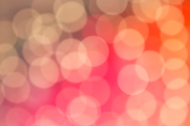 a blurry background with red and pink lights - Download Free Stock Photos Pikwizard.com