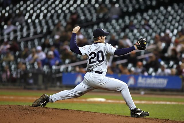 Selective Focus of Baseball Pitcher in 20 Jersey About to Throw Ball - Download Free Stock Photos Pikwizard.com