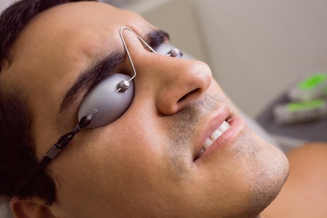 Patient wearing laser protective glasses - Download Free Stock Photos Pikwizard.com