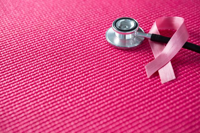 High angle view of pink Breast Cancer Awareness ribbon with stethoscope - Download Free Stock Photos Pikwizard.com