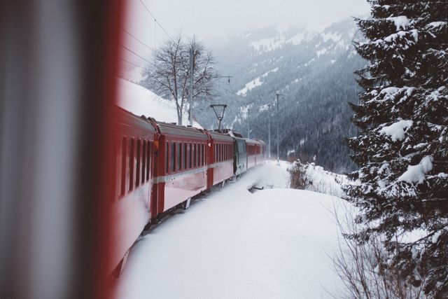 View of train running through a winter landscape. Winter season concept