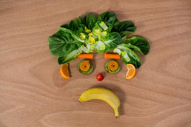 Sad face made of fruits and vegetables - Download Free Stock Photos Pikwizard.com