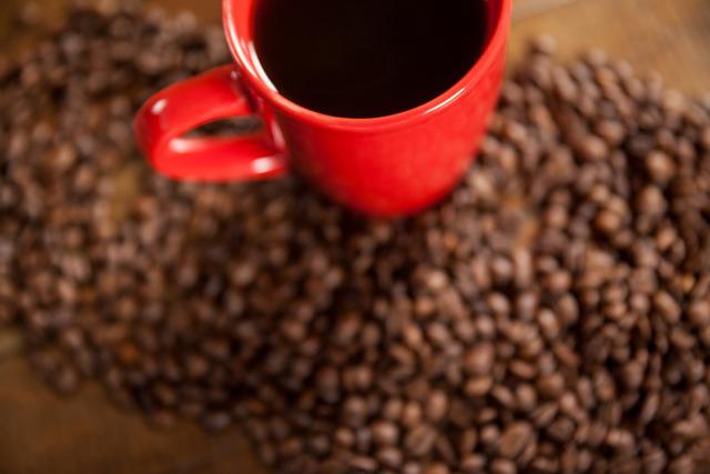 Cup of coffee and coffee beans - Download Free Stock Photos Pikwizard.com
