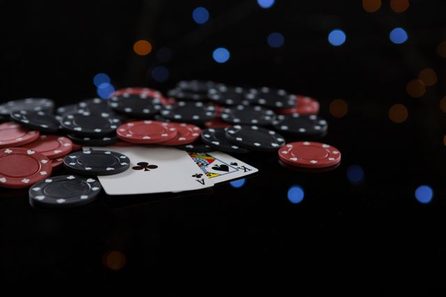 Close-up of cards and poker chips at casino