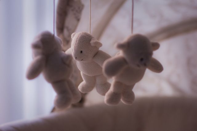 White Bear Plush Toy on Baby Mobile - Download Free Stock Photos Pikwizard.com