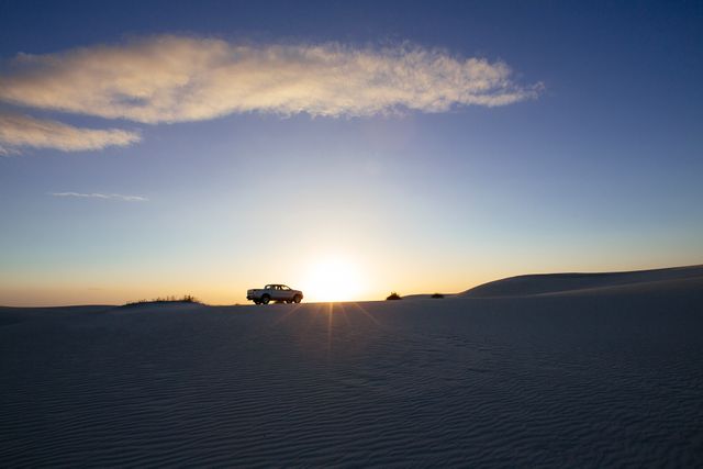 White Pick Up Truck on Desert Against Sunset - Download Free Stock Photos Pikwizard.com