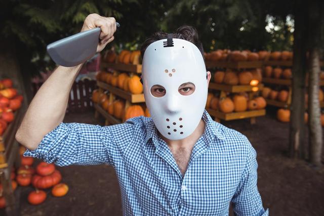 Man wearing halloween mask in market