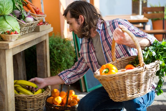 Man buying fruits and vegetables in organic shop - Download Free Stock Photos Pikwizard.com