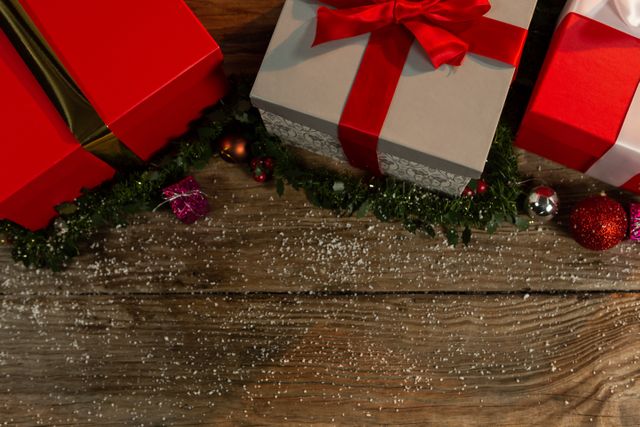 Christmas gifts on a wooden table - Download Free Stock Photos Pikwizard.com