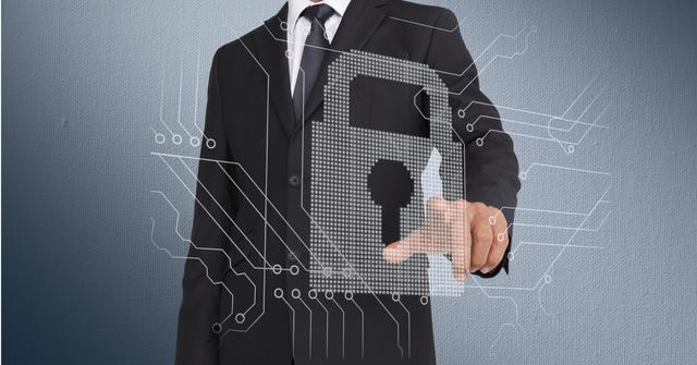 Businessman touching a lock on invisible screen - Download Free Stock Photos Pikwizard.com