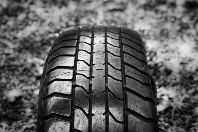 Close-up of Tire Against Blurred Background - Download Free Stock Photos Pikwizard.com