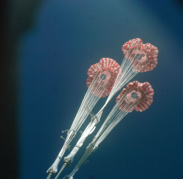 View of the parachutes of Skylab 3 command module during splashdown - Download Free Stock Photos Pikwizard.com
