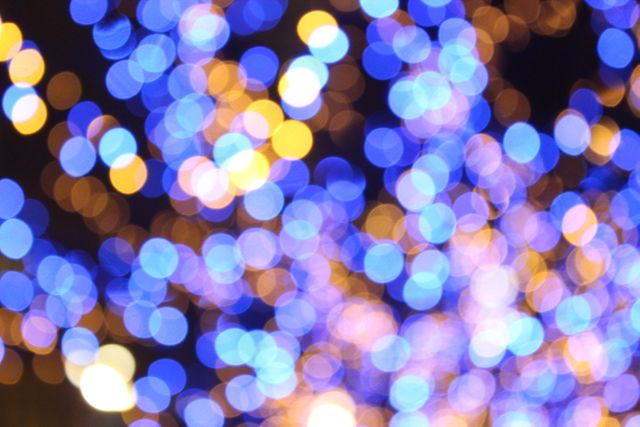 a blue and yellow lighted tree - Download Free Stock Photos Pikwizard.com