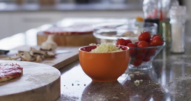 Cheese Beeing Grated In The Kitchen Stock Photo - Download Image