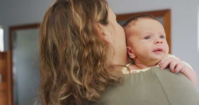 Image of caucasian mother holding and hugging newborn baby - Download Free Stock Photos Pikwizard.com