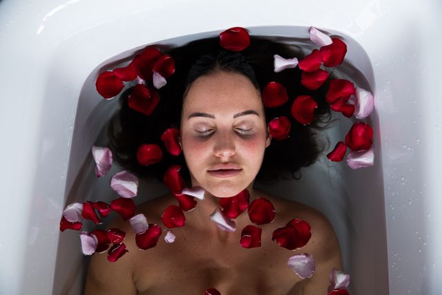 Caucasian woman taking bath of flower in hotel - Download Free Stock Photos Pikwizard.com