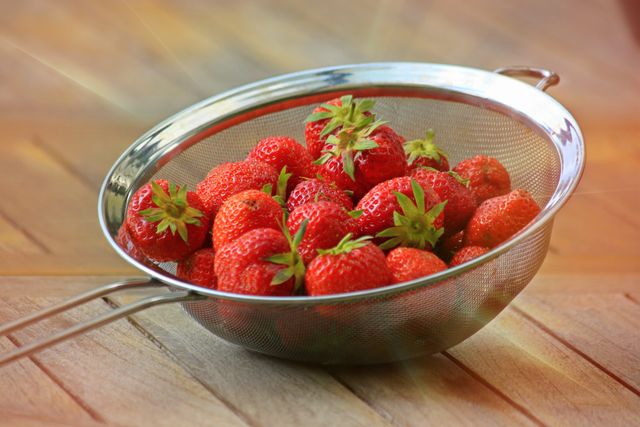 Strawberries on Stainless Steel Framed Strainer - Download Free Stock Photos Pikwizard.com