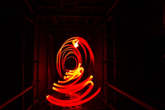 Long exposure photo of red lights in a tunnel. photography concept