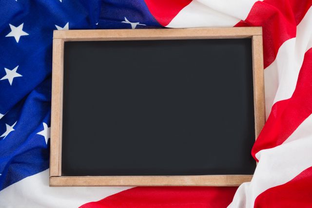 Close-up of blank slate on an American flag