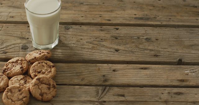 Image of biscuits with chocolate and milk on wooden background - Download Free Stock Photos Pikwizard.com