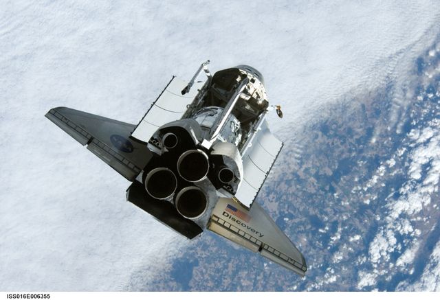 Discovery and Payload on approach to the ISS during the STS-120 Mission - Download Free Stock Photos Pikwizard.com
