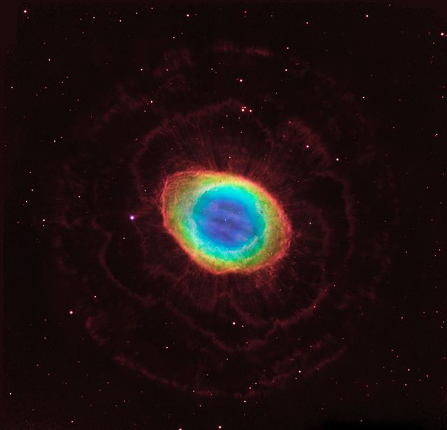 Caption: In this composite image, visible-light observations by NASA’s Hubble Space Telescope are combined with infrared data from the ground-based Large Binocular Telescope in Arizona to assemble a dramatic view of the well-known Ring Nebula.   Credit: NASA, ESA, C.R. Robert O’Dell (Vanderbilt University), G.J. Ferland (University of Kentucky), W.J. Henney and M. Peimbert (National Autonomous University of Mexico) Credit for Large Binocular Telescope data: David Thompson (University of Arizona)   ----  The Ring Nebula's distinctive shape makes it a popular illustration for astronomy books. But new observations by NASA's Hubble Space Telescope of the glowing gas shroud around an old, dying, sun-like star reveal a new twist.  &quot;The nebula is not like a bagel, but rather, it's like a jelly doughnut, because it's filled with material in the middle,&quot; said C. Robert O'Dell of Vanderbilt University in Nashville, Tenn. He leads a research team that used Hubble and several ground-based telescopes to obtain the best view yet of the iconic nebula. The images show a more complex structure than astronomers once thought and have allowed them to construct the most precise 3-D model of the nebula.  &quot;With Hubble's detail, we see a completely different shape than what's been thought about historically for this classic nebula,&quot; O'Dell said. &quot;The new Hubble observations show the nebula in much clearer detail, and we see things are not as simple as we previously thought.&quot;   The Ring Nebula is about 2,000 light-years from Earth and measures roughly 1 light-year across. Located in the constellation Lyra, the nebula is a popular target for amateur astronomers. Read more: <a href="http://1.usa.gov/14VAOMk" rel="nofollow">1.usa.gov/14VAOMk</a>  <b><a href="http://www.nasa.gov/audience/formedia/features/MP_Photo_Guidelines.html" rel="nofollow">NASA image use policy.</a></b>  <b><a href="http://www.nasa.gov/centers/goddard/home/index.html" rel="nofollow">NASA Goddard Space Flight Center</a></b> enables NASA’s mission through four scientific endeavors: Earth Science, Heliophysics, Solar System Exploration, and Astrophysics. Goddard plays a leading role in NASA’s accomplishments by contributing compelling scientific knowledge to advance the Agency’s mission.  <b>Follow us on <a href="http://twitter.com/NASA_GoddardPix" rel="nofollow">Twitter</a></b>  <b>Like us on <a href="http://www.facebook.com/pages/Greenbelt-MD/NASA-Goddard/395013845897?ref=tsd" rel="nofollow">Facebook</a></b>  <b>Find us on <a href="http://instagram.com/nasagoddard?vm=grid" rel="nofollow">Instagram</a></b>