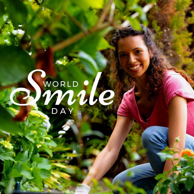 Composition of world smile day text over biracial woman in garden. World smile day and celebration concept digitally generated image.