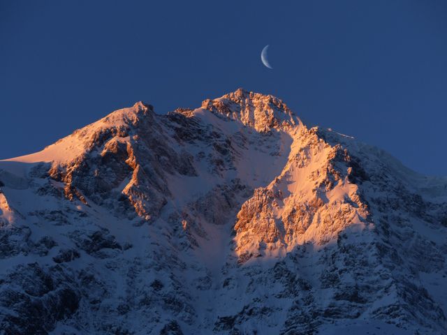 Crescent Moon over Snow Mountain - Download Free Stock Photos Pikwizard.com