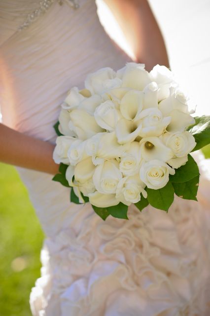 Woman in Wedding Dress Holding White Flower Bouquet - Download Free Stock Photos Pikwizard.com