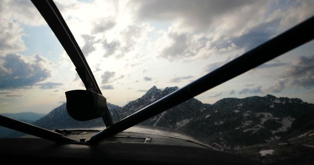 Private aircraft flying over snowcovered mountain 4k