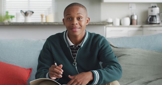 Image of happy african american boy having online lessons at home - Download Free Stock Photos Pikwizard.com