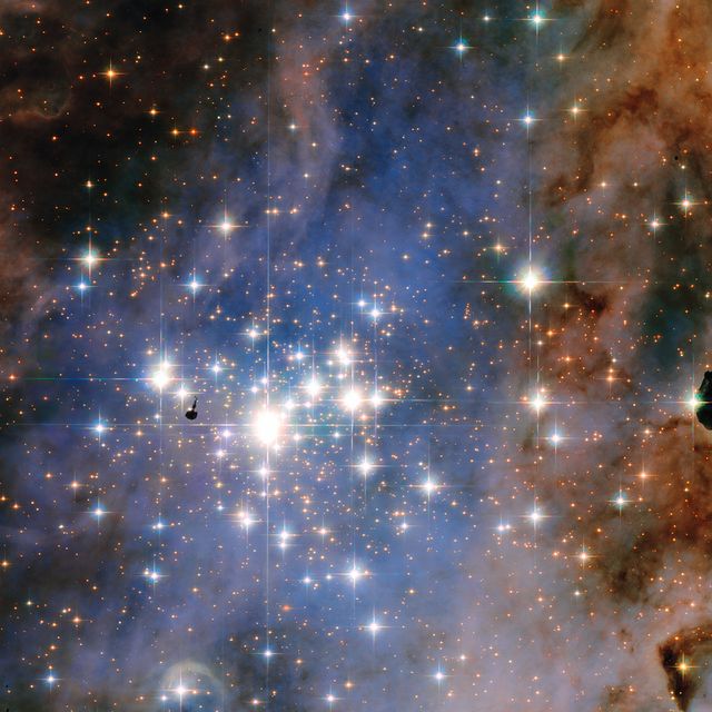 Resembling an opulent diamond tapestry, this image from NASA’s Hubble Space Telescope shows a glittering star cluster that contains a collection of some of the brightest stars seen in our Milky Way galaxy. Called Trumpler 14, it is located 8,000 light-years away in the Carina Nebula, a huge star-formation region. Because the cluster is only 500,000 years old, it has one of the highest concentrations of massive, luminous stars in the entire Milky Way. The small, dark knot left of center is a nodule of gas laced with dust, and seen in silhouette.  Credit: NASA/ESA/J. Maíz Apellániz (Institute of Astrophysics of Andalusia, Spain)  <b><a href="http://www.nasa.gov/audience/formedia/features/MP_Photo_Guidelines.html" rel="nofollow">NASA image use policy.</a></b>  <b><a href="http://www.nasa.gov/centers/goddard/home/index.html" rel="nofollow">NASA Goddard Space Flight Center</a></b> enables NASA’s mission through four scientific endeavors: Earth Science, Heliophysics, Solar System Exploration, and Astrophysics. Goddard plays a leading role in NASA’s accomplishments by contributing compelling scientific knowledge to advance the Agency’s mission. <b>Follow us on <a href="http://twitter.com/NASAGoddardPix" rel="nofollow">Twitter</a></b> <b>Like us on <a href="http://www.facebook.com/pages/Greenbelt-MD/NASA-Goddard/395013845897?ref=tsd" rel="nofollow">Facebook</a></b> <b>Find us on <a href="http://instagram.com/nasagoddard?vm=grid" rel="nofollow">Instagram</a></b>  