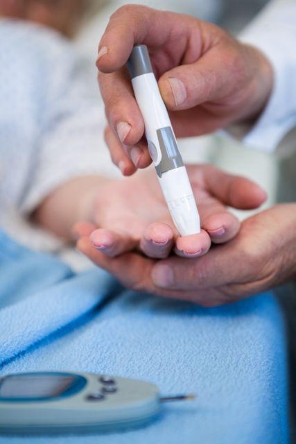 Doctor testing diabetes of senior patient with insulin pen - Download Free Stock Photos Pikwizard.com