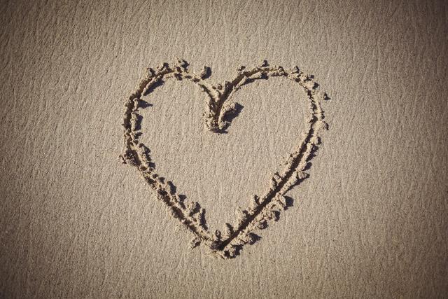 Heart drawn on sand - Download Free Stock Photos Pikwizard.com