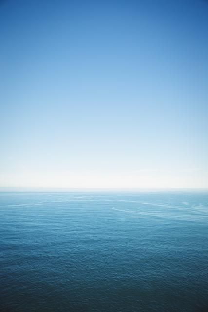 Sea under clear blue sky - Download Free Stock Photos Pikwizard.com