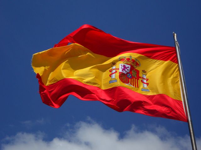Spain Flag in Pole - Download Free Stock Photos Pikwizard.com