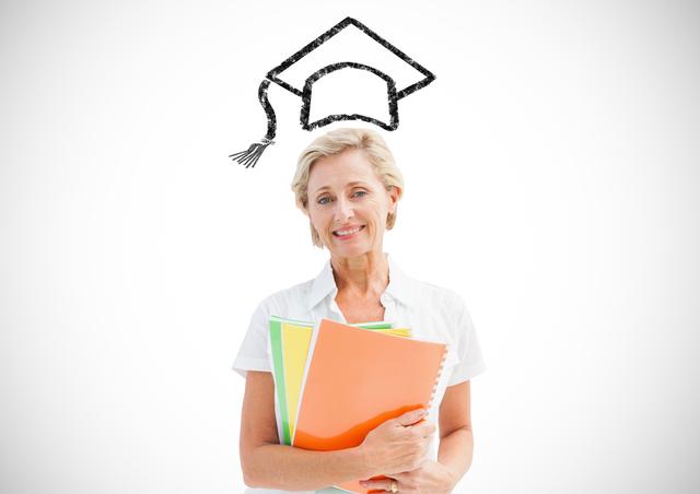 Senior woman holding files with graduation cap in background - Download Free Stock Photos Pikwizard.com