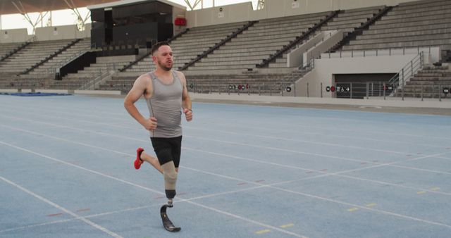 Caucasian disabled male athlete with running blade training and running - Download Free Stock Photos Pikwizard.com