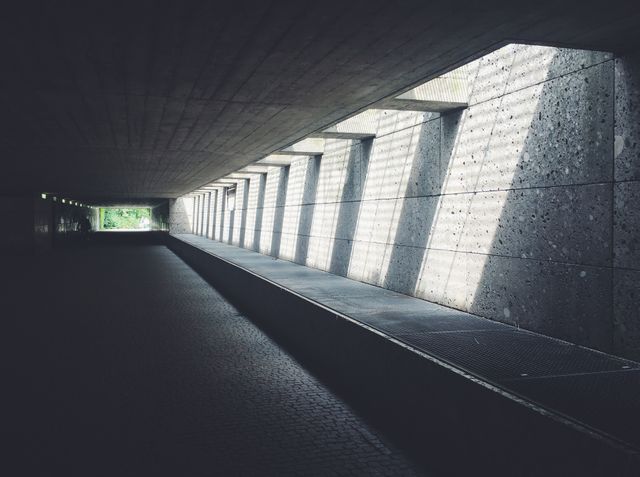 Sunlight Streaming Through Concrete Opening of Underground Passageway - Download Free Stock Photos Pikwizard.com