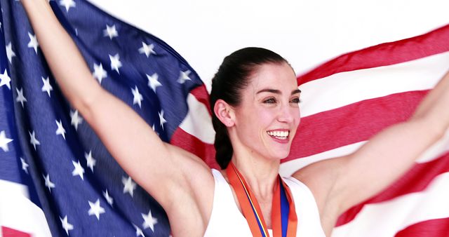 Happy athlete holding American flag on white screen - Download Free Stock Photos Pikwizard.com