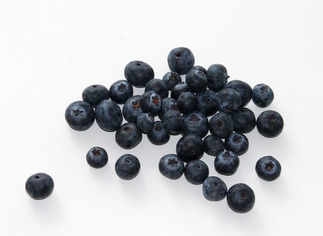 a bunch of blueberries - Download Free Stock Photos Pikwizard.com