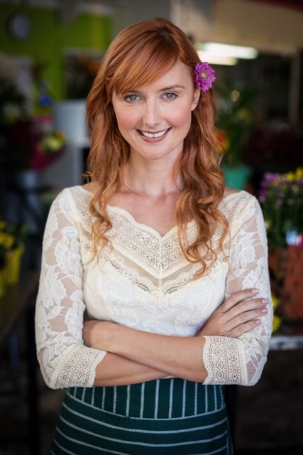 Portrait of female florist smiling - Download Free Stock Photos Pikwizard.com